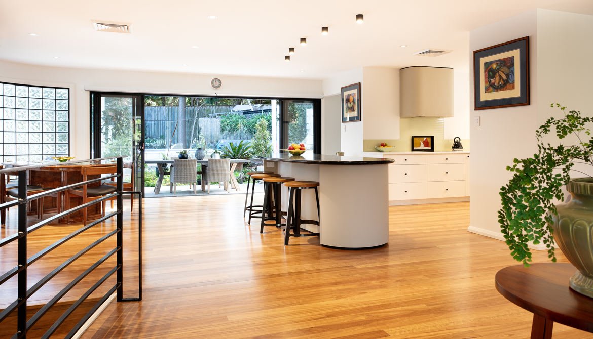 modern designer home in Sydney - kitchen and family area with view to outside deck